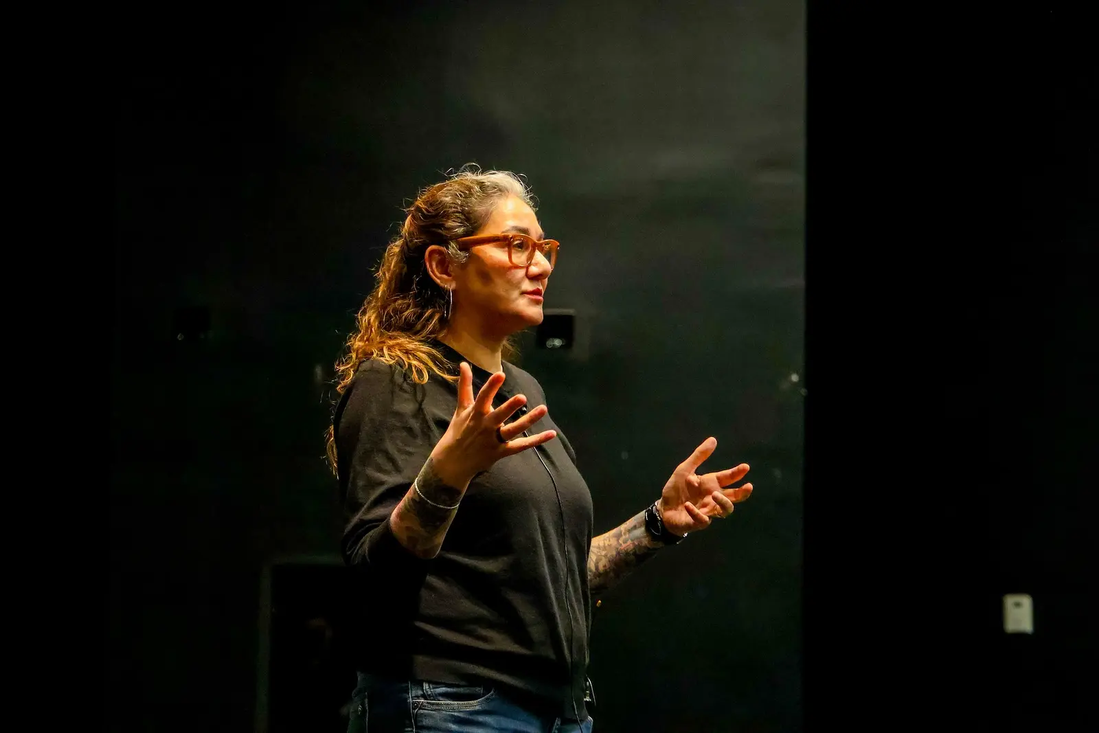 Sonya Zuker presenting at the Invisible Threads StoryShare, April 2026